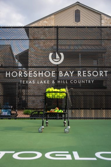 Outdoor tennis court at Mouratoglou Tennis Center Horseshoe Bay.