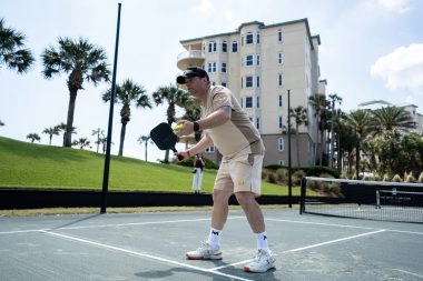 Coach playing pickleball at Mouratoglou Tennis Center Amelia Island