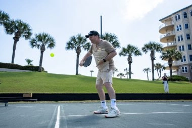 Coach playing pickleball at Mouratoglou Tennis Center Amelia Island
