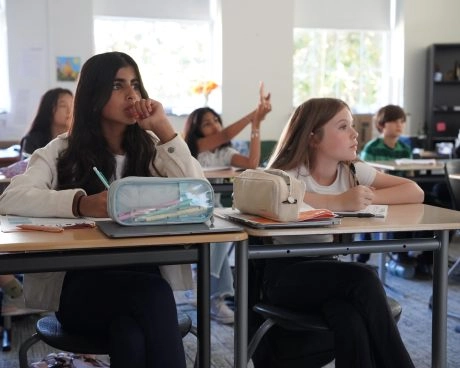 Two young girls studying in a classroom at Mouratoglou Academy Atlanta, part of the Atlanta International School program.
