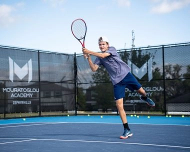 Tennis player hitting double handed backhand at MTC Zephyrhills