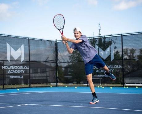 Tennis player hitting double handed backhand at MTC Zephyrhills