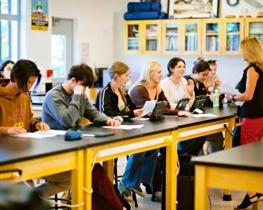 Students sitting at desks and engaging in classroom learning at Mouratoglou Academy San Francisco.