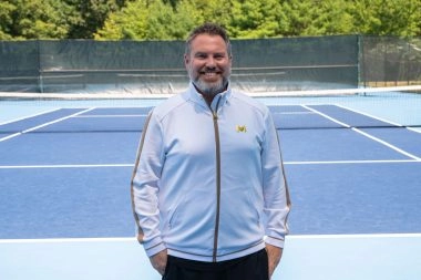 Coach wearing M Apparel on court at Mouratoglou Tennis Center Boston