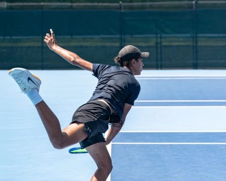 Tennis player serving during training at Mouratoglou Tennis Center Boston, Massachusetts