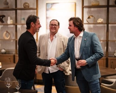Patrick Mouratoglou greeting guests inside the restaurant at The Ritz-Carlton, Amelia Island.