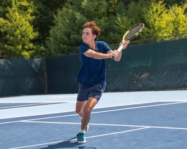 Young tennis player training on court in Mouratoglou Tennis Center Boston,Massachusetts