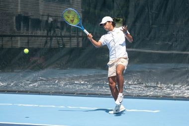 Tennis player practicing on court at Mouratoglou Tennis Center Boston, Massachusetts