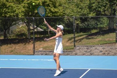 Adult player on court at Mouratoglou Tennis Center Boston