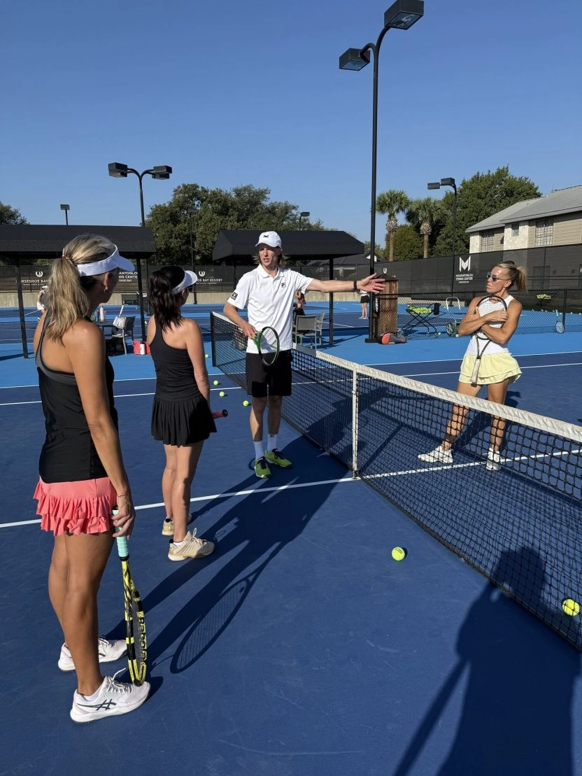 Andreas Seppi coaching players during an adult tennis clinic at Mouratoglou Tennis Center Horseshoe Bay.