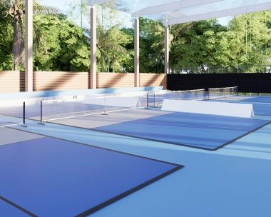 Semi-indoor pickleball courts at Mouratoglou Tennis Center Bali with multiple courts and tropical surroundings.