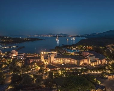 Night aerial view of Hotel Cala di Volpe near Mouratoglou Tennis Center in Costa Smeralda, Sardinia.