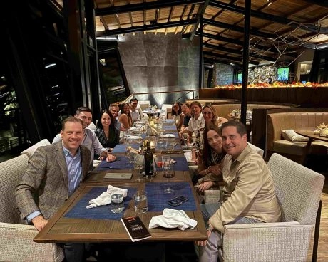 Guests enjoying a private dinner and networking event hosted by Mouratoglou Tennis Center Horseshoe Bay.
