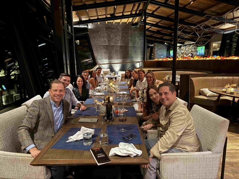 Guests enjoying a private dinner and networking event hosted by Mouratoglou Tennis Center Horseshoe Bay.