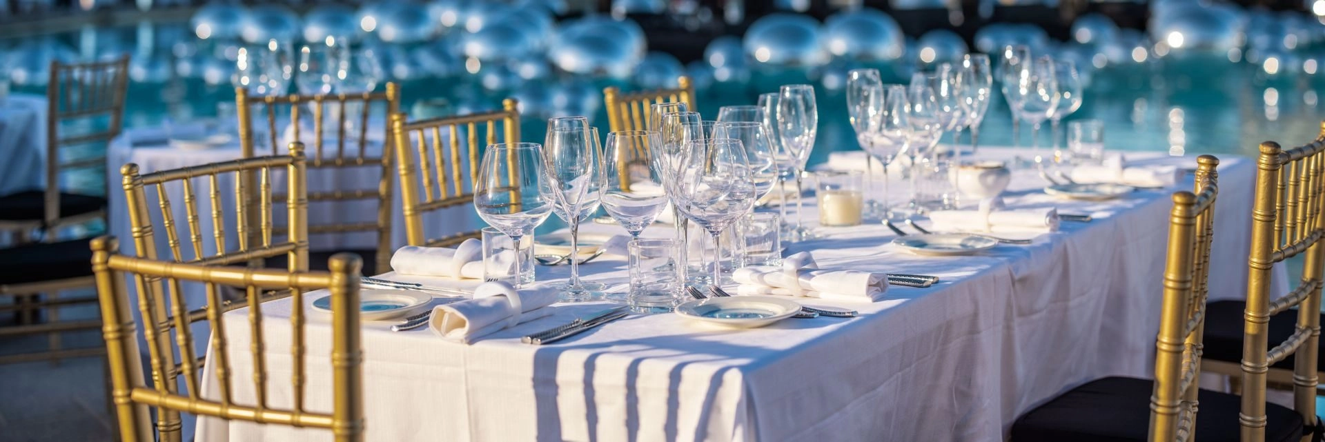 Elegant outdoor dining setup at Hotel Cala di Volpe prepared for a private event or gala dinner.