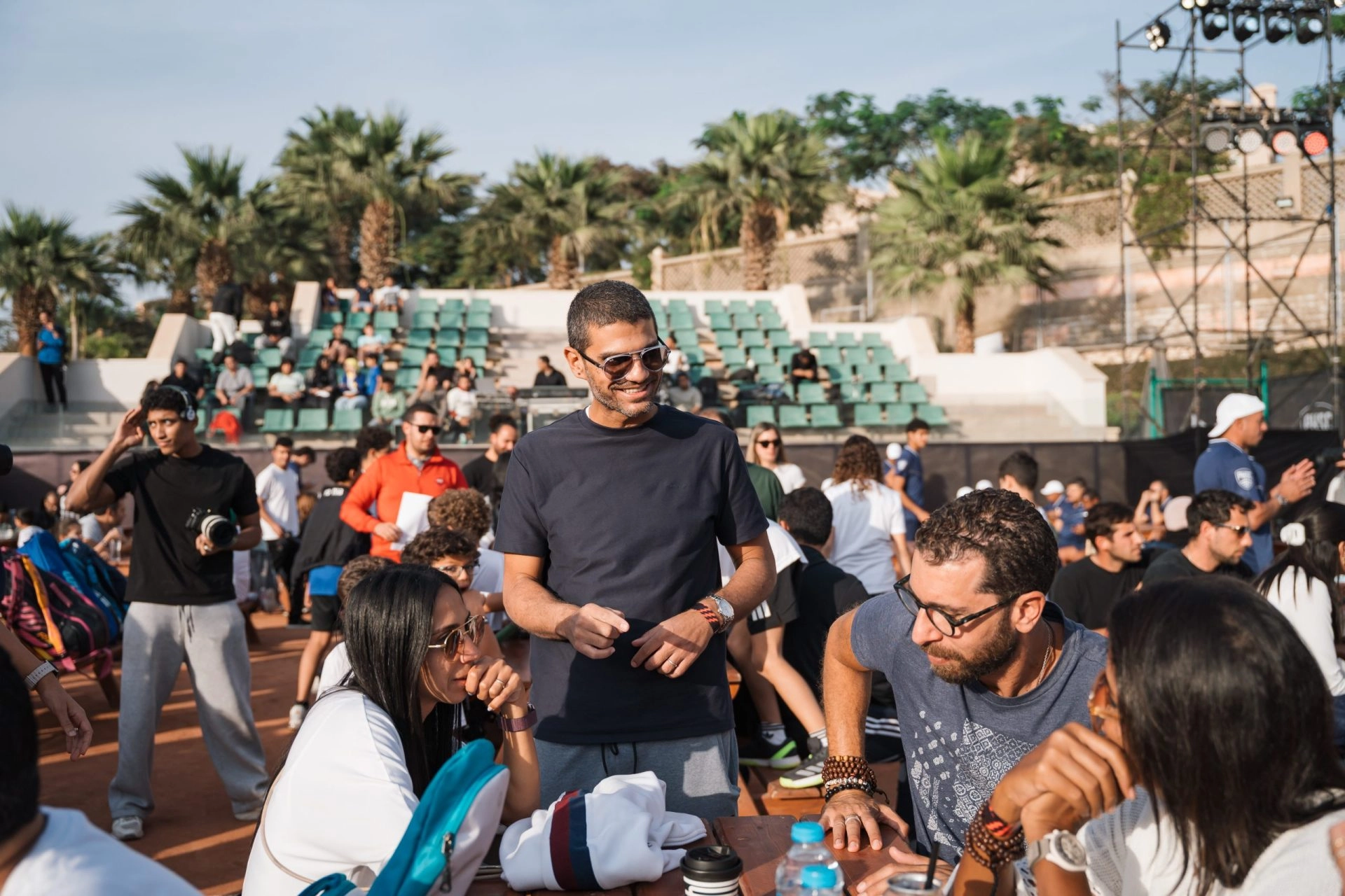 Guests and participants socializing during a community event at Mouratoglou Tennis Center Palm Hills Cairo in Egypt.