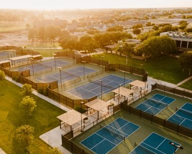 Aerial view of outdoor tennis and padel courts at Mouratoglou Tennis Center Odessa Midland at La Estancia.